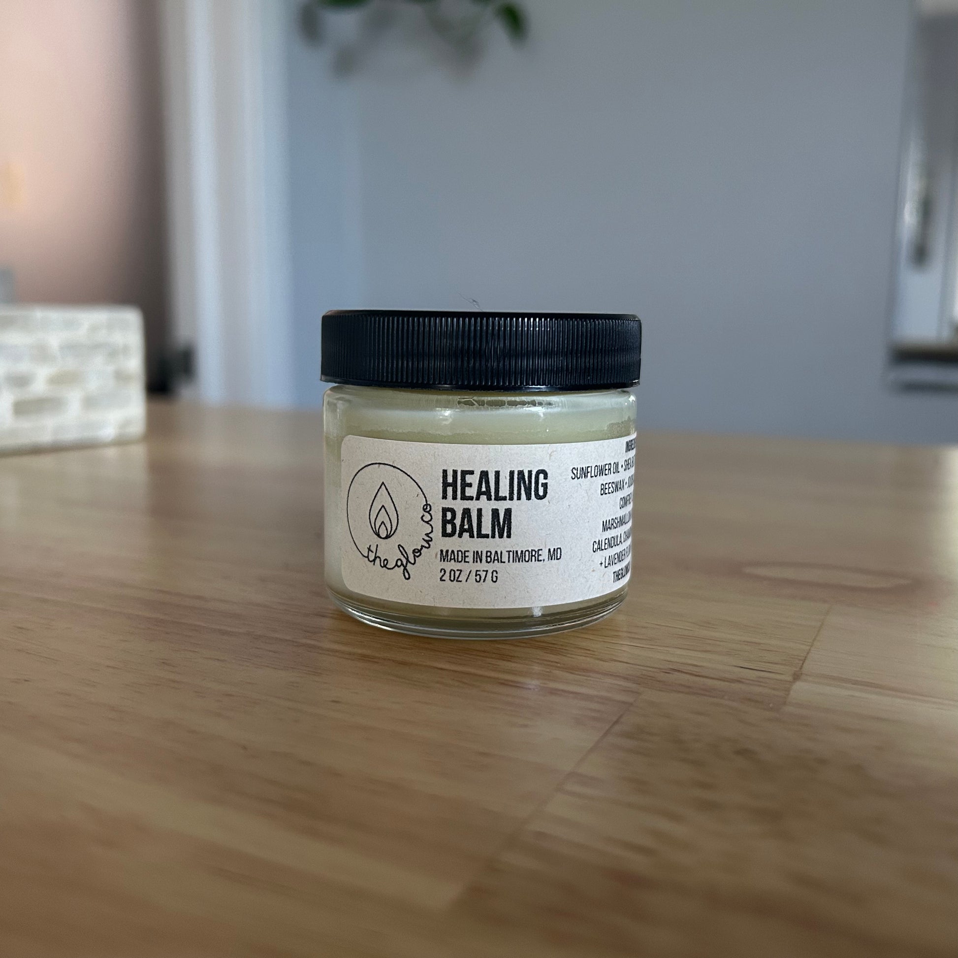 2 ounce glass jar of Healing Balm by The Glow Co.